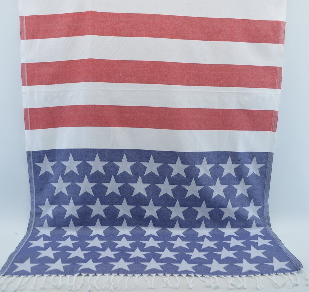 American Flag Turkish Towel Size: 40”W x70”L + fringe Hand loomed in Turkey with 100% Natural Turkish Cotton Can be used as beach towel, bath towel, scarf, table cloth, picnic blanket, sarong, light throw, bath sheet and much more. Light and airy Quick drying Extremely absorbent Sand resistant Eco-Friendly Soft Large in size and yet compact Convenient for travel Authentic and versatile Thin Softer and more absorbent with every wash Machine wash on cool. Tumble dry on low heat.